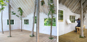 Brooks_David_image 13 David Brooks, Budding Bird Blind, 2020-ongoing, Wood, hardware, stucco, paint, with forest procession of American tulip trees, flowering dogwoods, northern red oak, maples and serviceberry trees (bird attractive species)